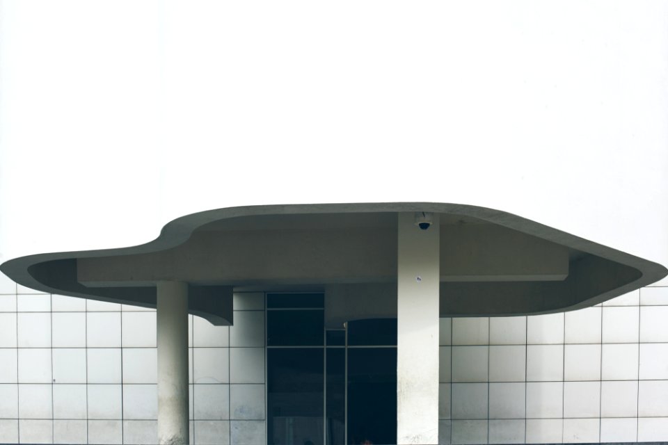white and black concrete building at daytime photo