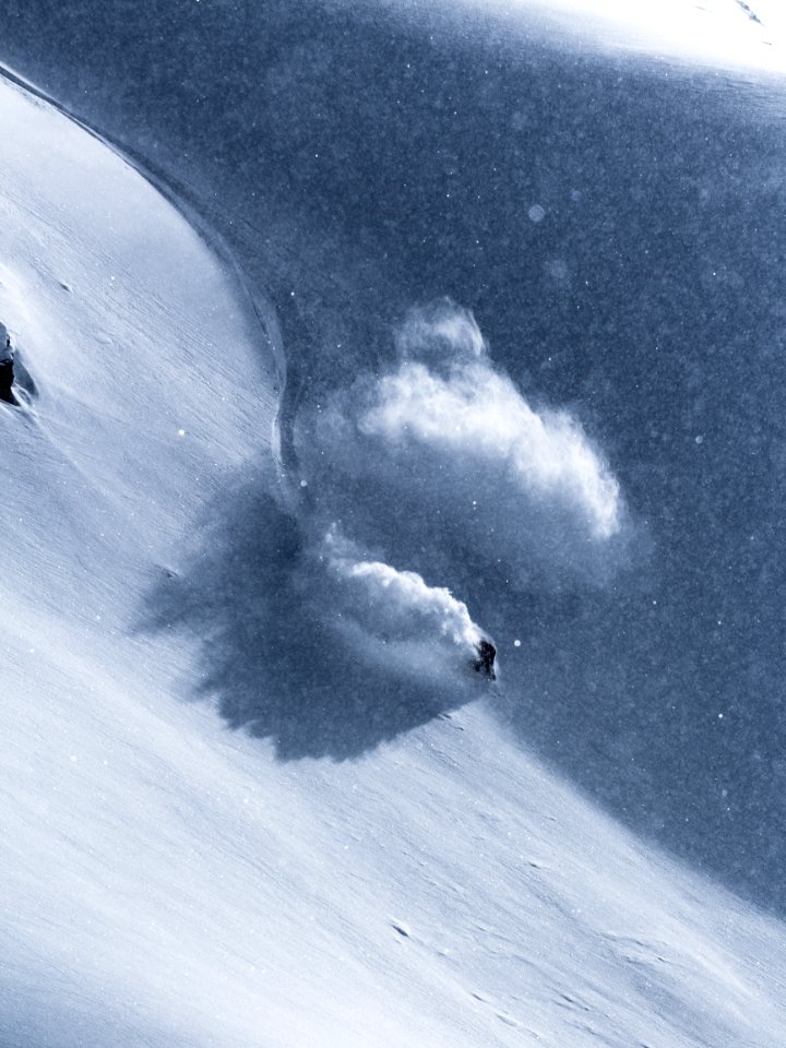 person snowboarding on tundra