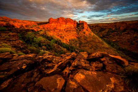 aerial view of rock cliffs under cloudy sky photo