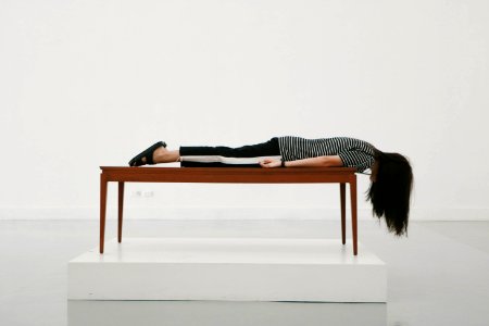 woman planking on thable photo