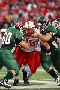 Defensive tackle offensive linemen aggression photo