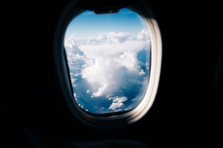 opened airplane window photo