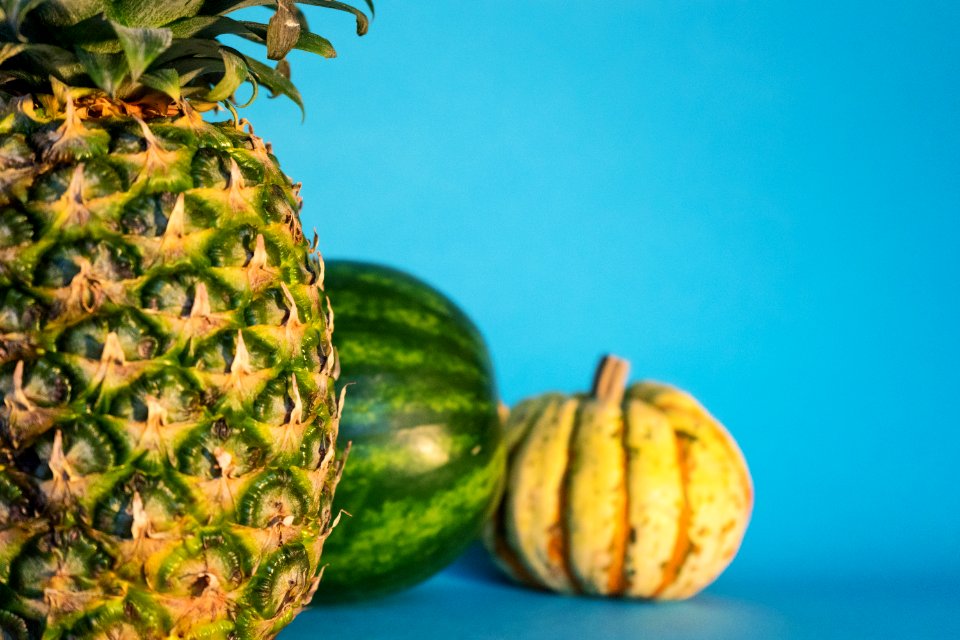 close-up photo of pineapple, watermelon, and squash