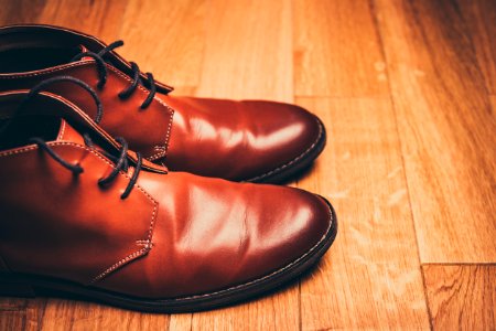 pair of brown leather lace-up boots photo