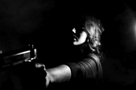 woman holding pistol photo