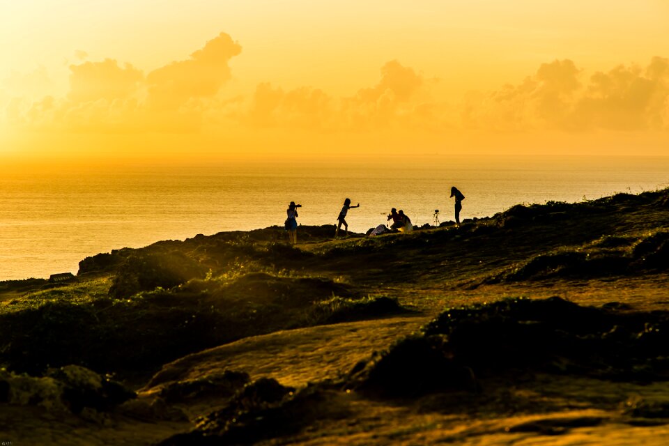 Sunset people taking pictures