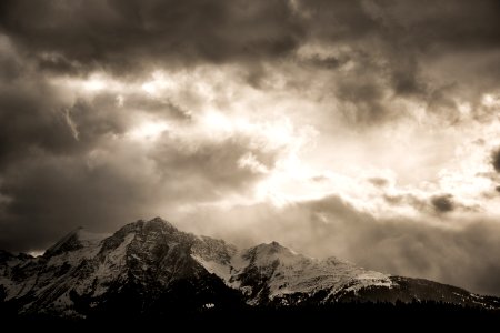 grayscale photography of snow covered mountain photo