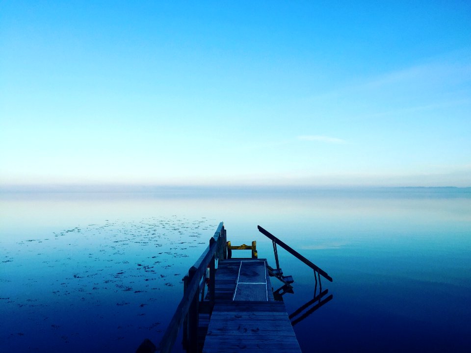 photography of calm body of water