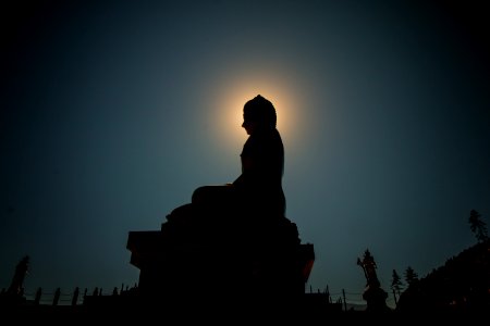 silhouette photo of Buddha statue photo