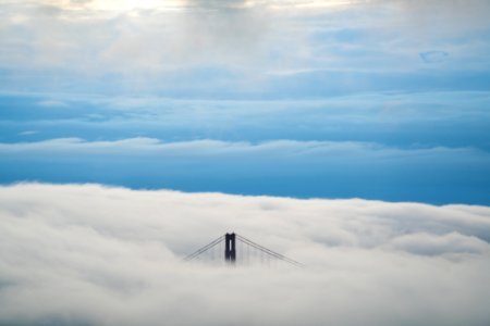 Golden Gate Bridge cover with white cloudy skies photo