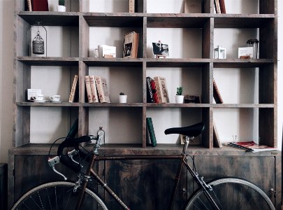 bicycle leaning on shelf photo