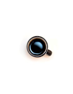top view of white ceramic coffee mug photo