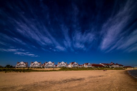 landscape photography of house under white clouds photo