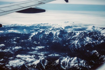 aerial photography of range mountains covered with snow photo