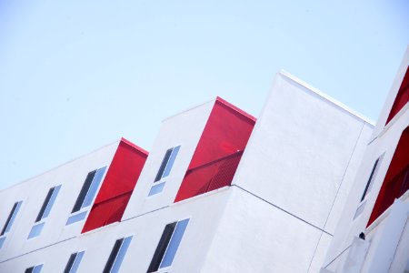 white and red concrete building photo photo