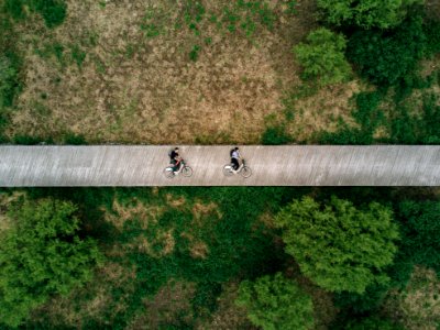 aerial view photography of two person on road photo