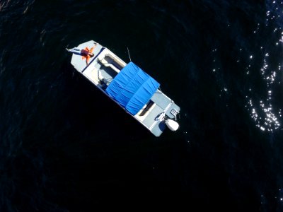aerial photo of gray boat on body of water photo