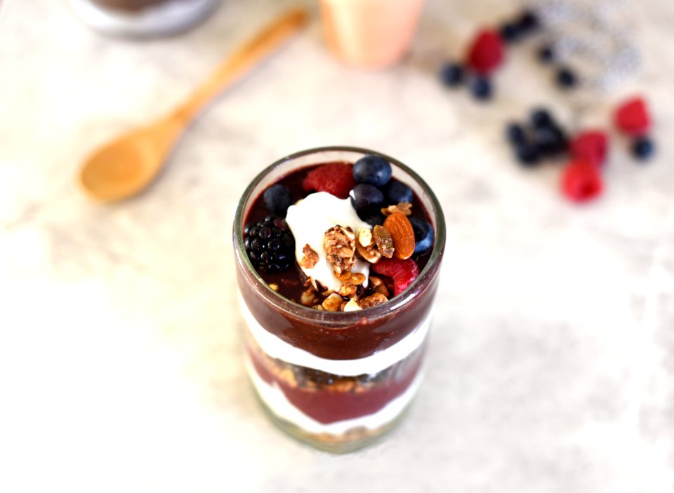 selective focus photography of fruit desert on glass container