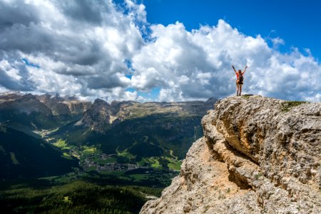 woman standing on mountain photo
