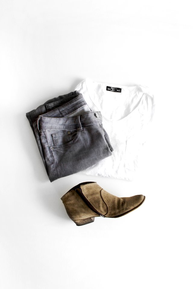 white crew neck t-shirt and brown leather boots