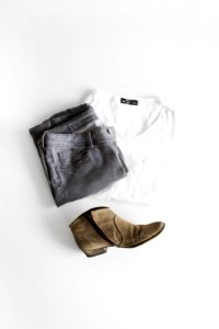 white crew neck t-shirt and brown leather boots photo