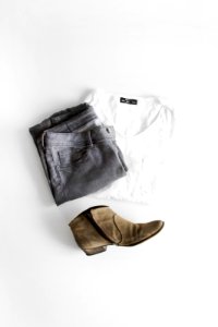 white crew neck t-shirt and brown leather boots
