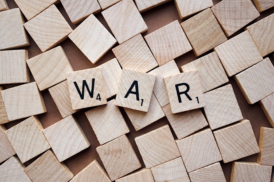 Scrabble combat brown letter