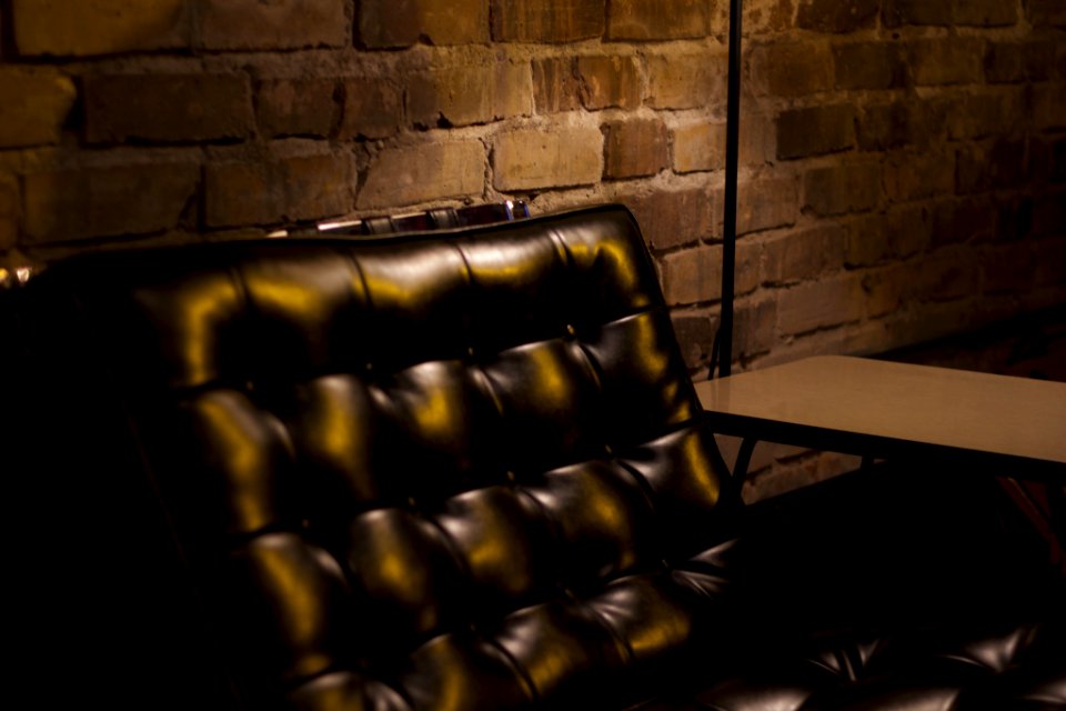 Brick wall, Leather couch, Coffee shop photo
