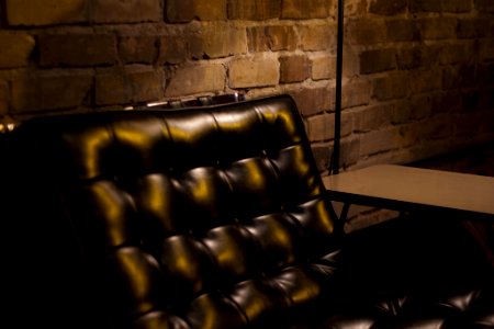 Brick wall, Leather couch, Coffee shop photo