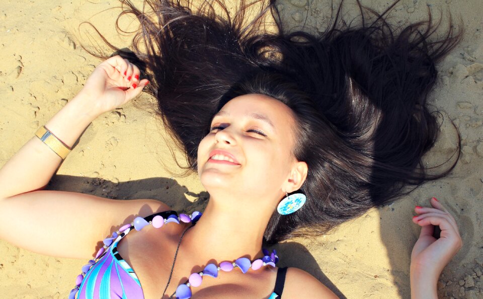 Brunette smile sand