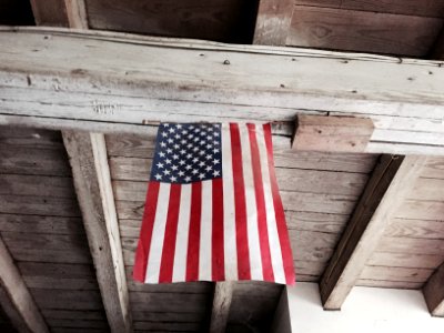 U.S. American flag hanging on ceiling photo