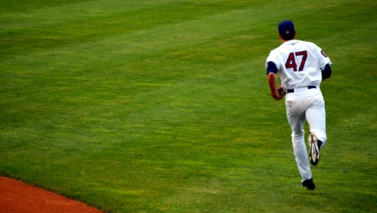 baseball player 47 running in field photo