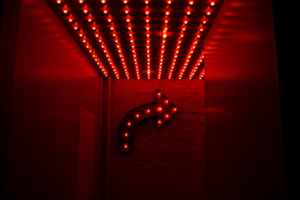 red marquee light going right