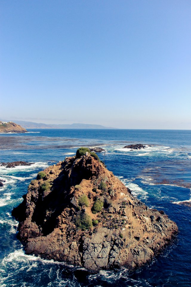 high angle photography brown and green island photo