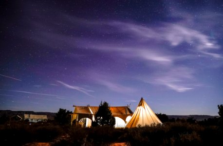 camping tent on field during nighttime