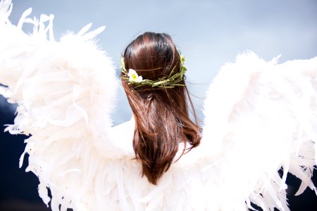 woman wearing white angel wings photo