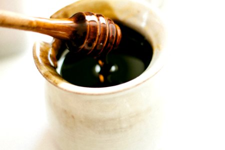 brown wooden honey dipper