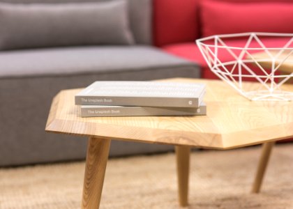 two gray books on brown wooden table photo