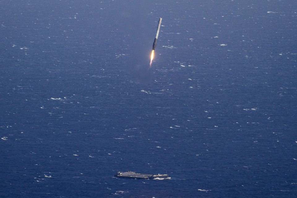 aircraft carrier and missile launching during daytime
