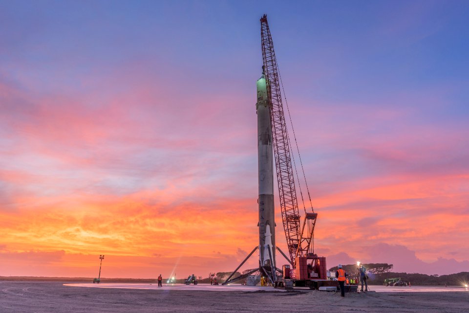 orange and white tower crane