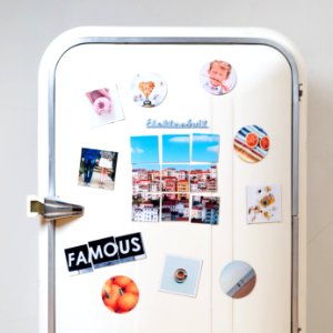 assorted-type photos stick on white single-door refrigerator photo