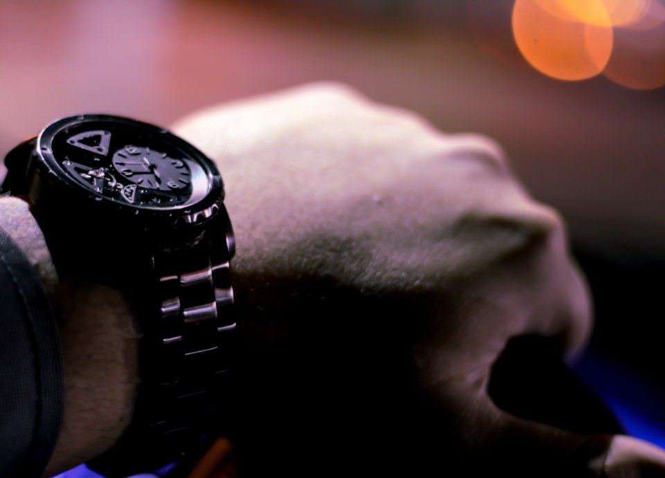 selective photo of person holding vehicle steering wheel