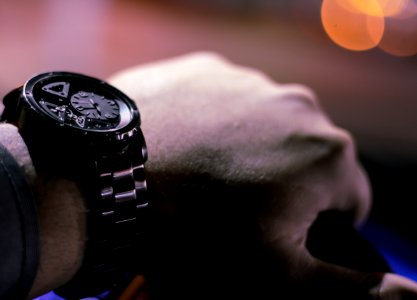 selective photo of person holding vehicle steering wheel photo