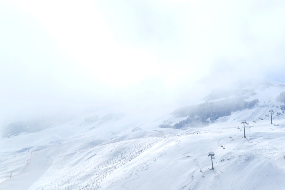 snow covered mountain during daytime