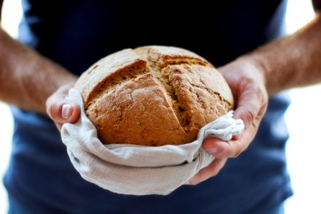 person holding pastry photo