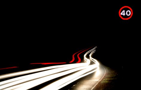 long-exposure photography of light streaks on road during nighttime photo