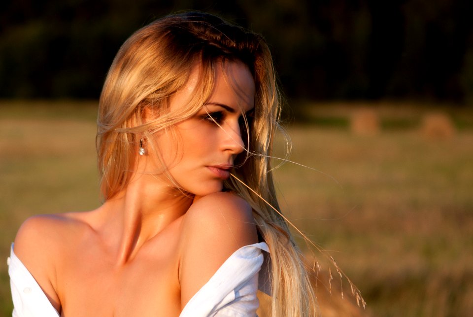 woman in white off-shoulder top
