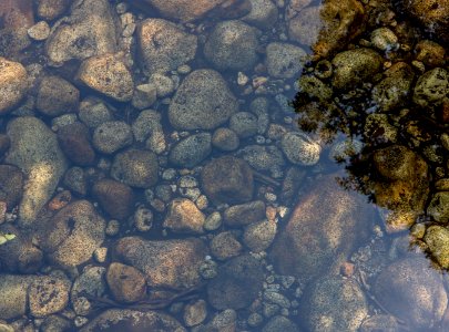 stones in body of water