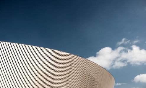 white building under blu sky