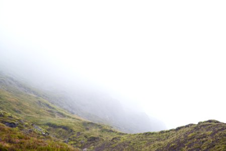 green mountain and fog photo